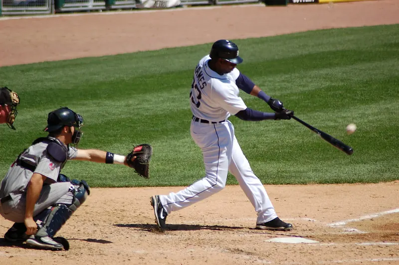 A batter takes a swing at a pitch