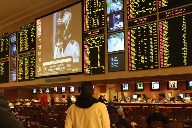 A sportsbook betting board with odds on games