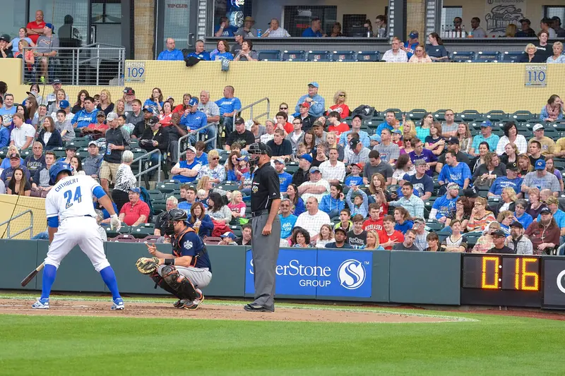 A pitch clock counting down behind home plate