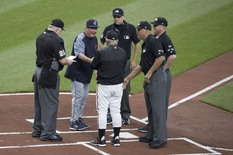 A home plate umpire calls a pitch